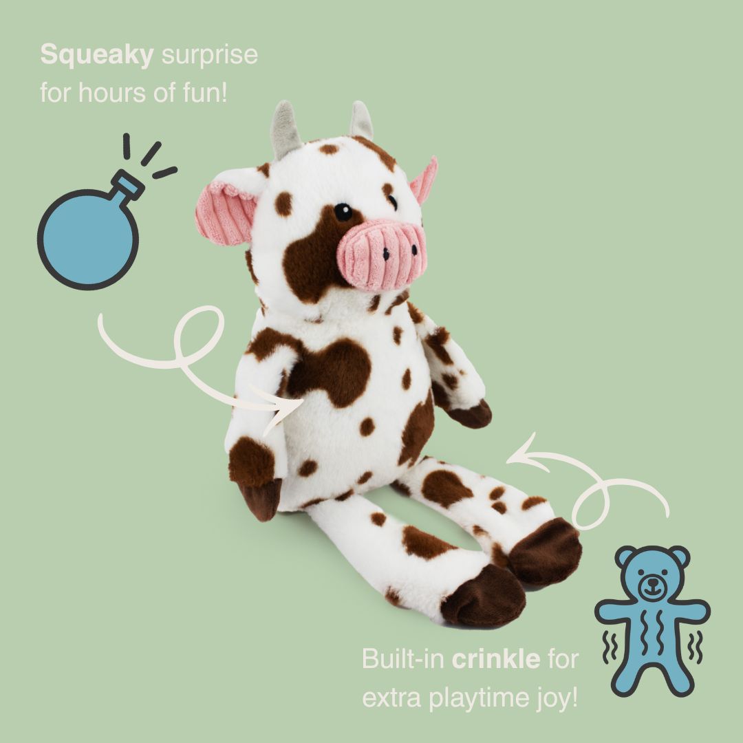 8.5" Cow w/ squeaker and crinkle plush dog toy with soft fabric, designed for gentle play and cuddling